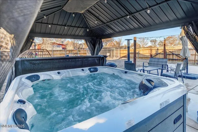 a view of a swimming pool with a lounge chairs