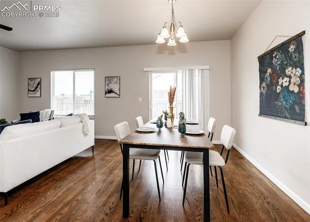 a spacious bedroom with a bed and a ceiling fan