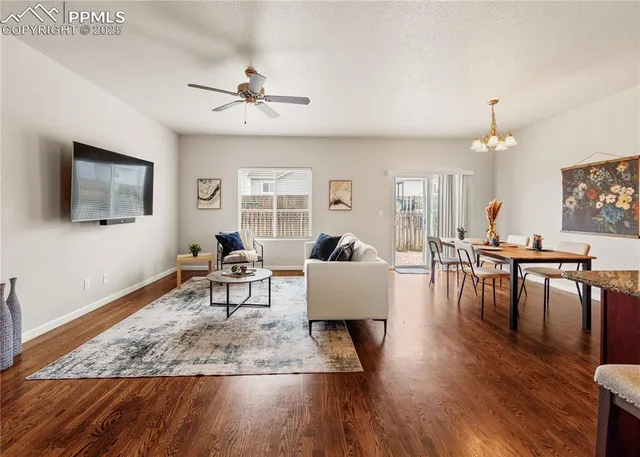 a view of an empty room with windows