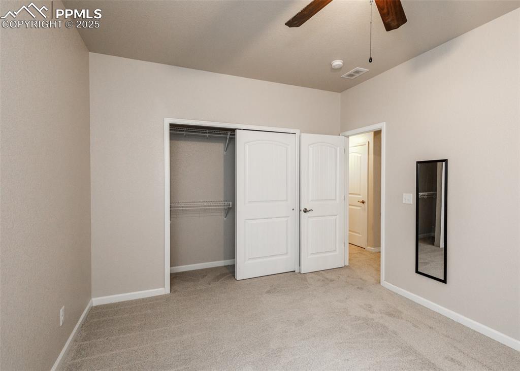 11324 Neutra Grove Peyton, CO 80831 - Photo 37 of 49 wooden floor in an empty room