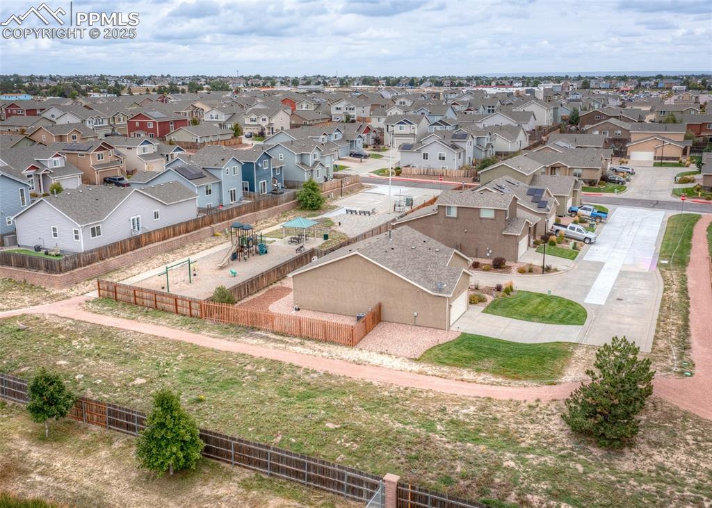 11324 Neutra Grove Peyton, CO 80831 - Photo 47 of 49 an aerial view of residential houses with outdoor space