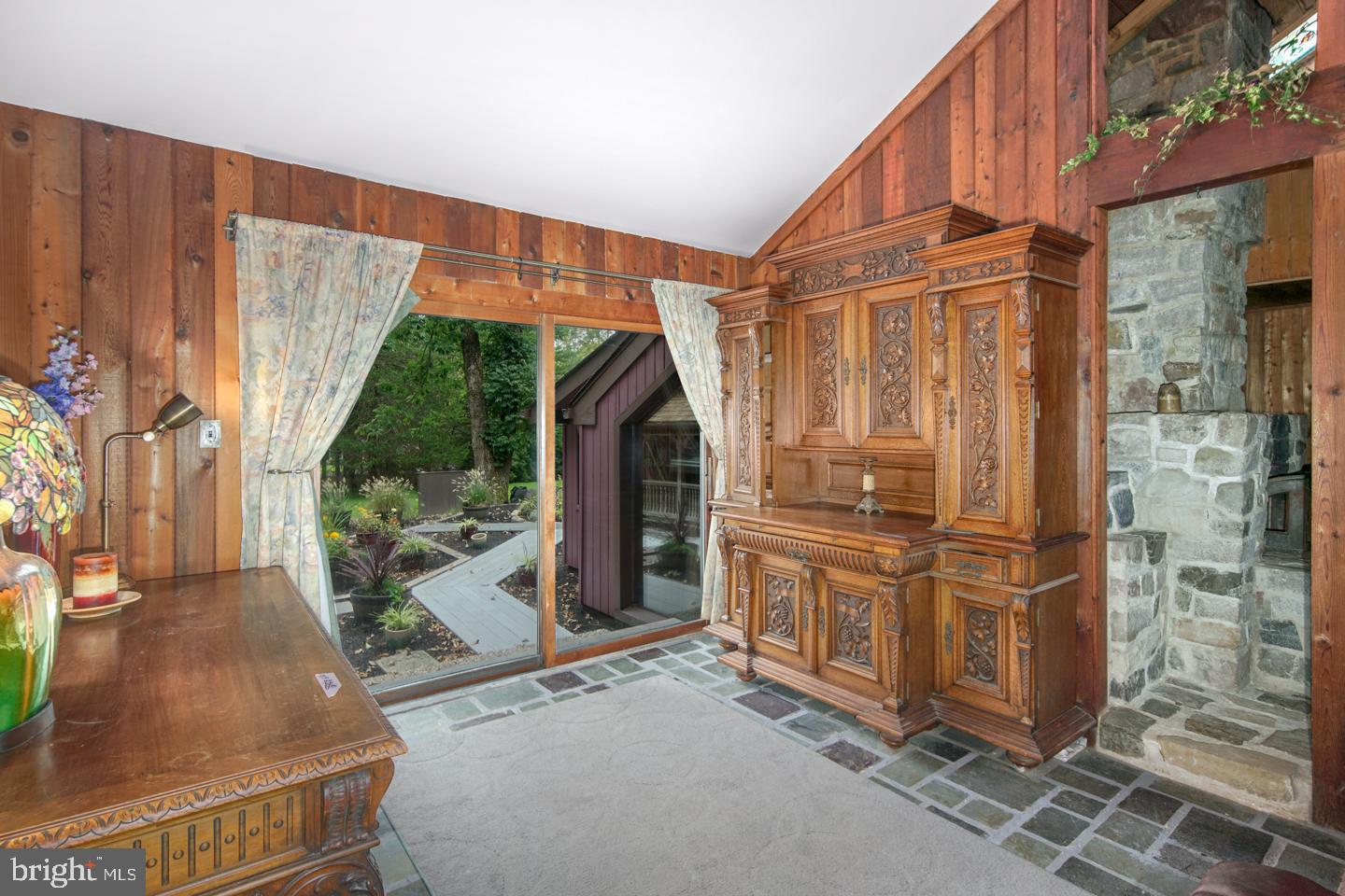 1500 Sugar Bottom Road Furlong, PA 18925 - Photo 6 of 41 Family room with view of gazebo and grill