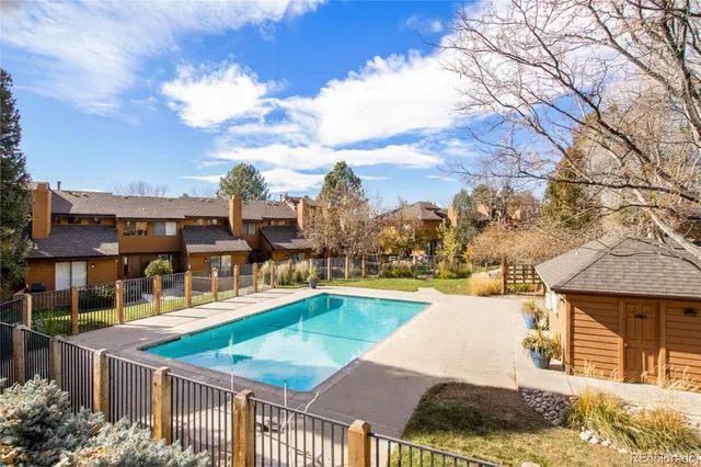 a view of a swimming pool with a lounge chairs