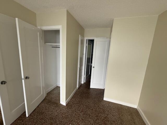 116 Mayfield Road, Unit 3 Lantana, FL 33462 - Photo 4 of 8 a view of hallway with closet and wooden floor