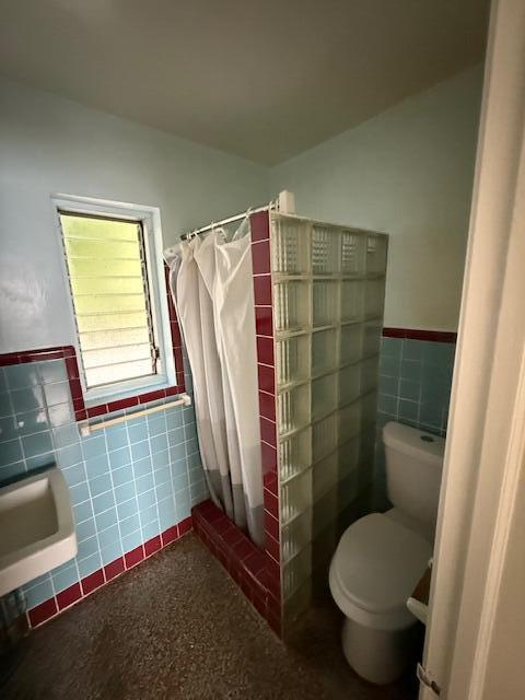 116 Mayfield Road, Unit 3 Lantana, FL 33462 - Photo 5 of 8 a bathroom with a toilet and a shower