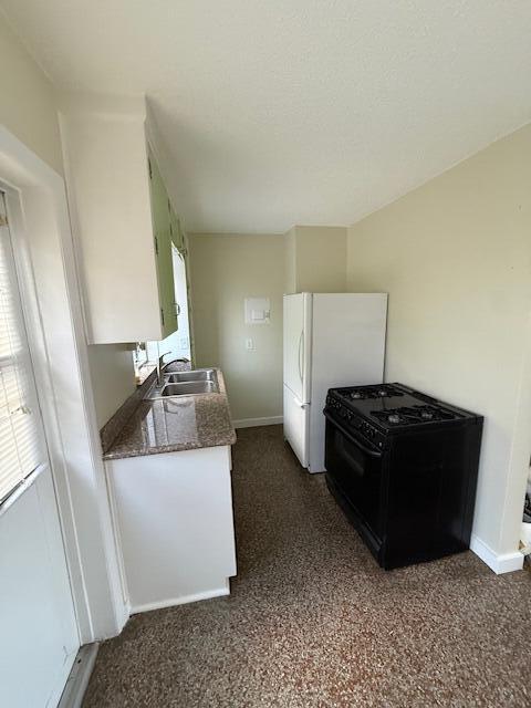 116 Mayfield Road, Unit 3 Lantana, FL 33462 - Photo 6 of 8 a living room with a couch and a stove top oven