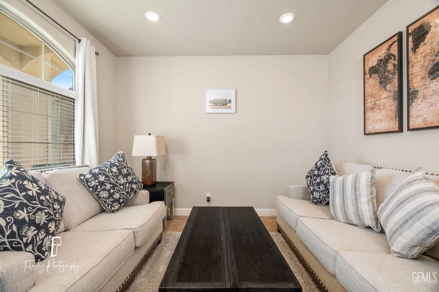 Undisclosed Address Bakersfield, CA 93313 - Photo 11 of 36 a living room with furniture and a window