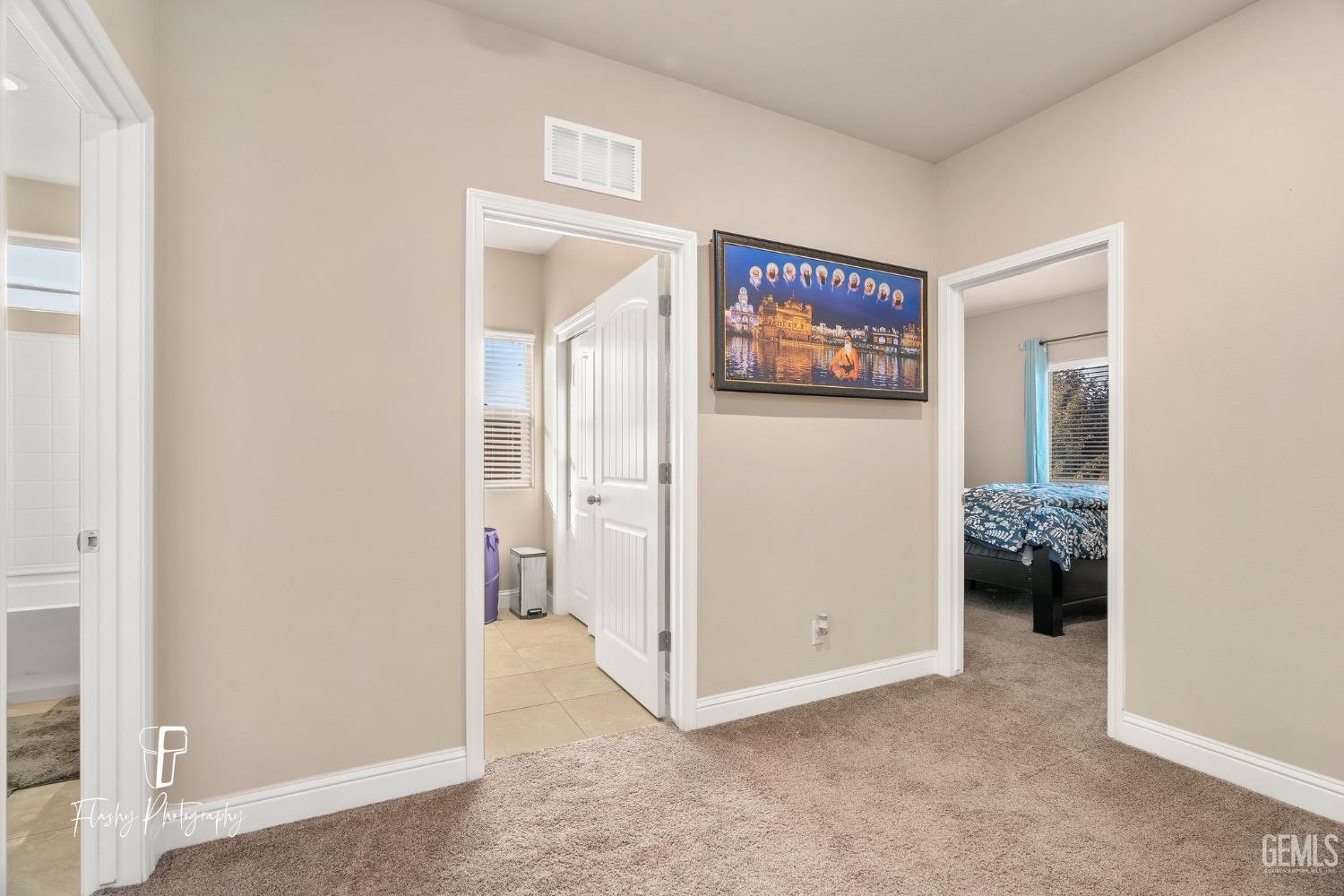 Undisclosed Address Bakersfield, CA 93313 - Photo 21 of 36 a view of a bedroom with a hallway