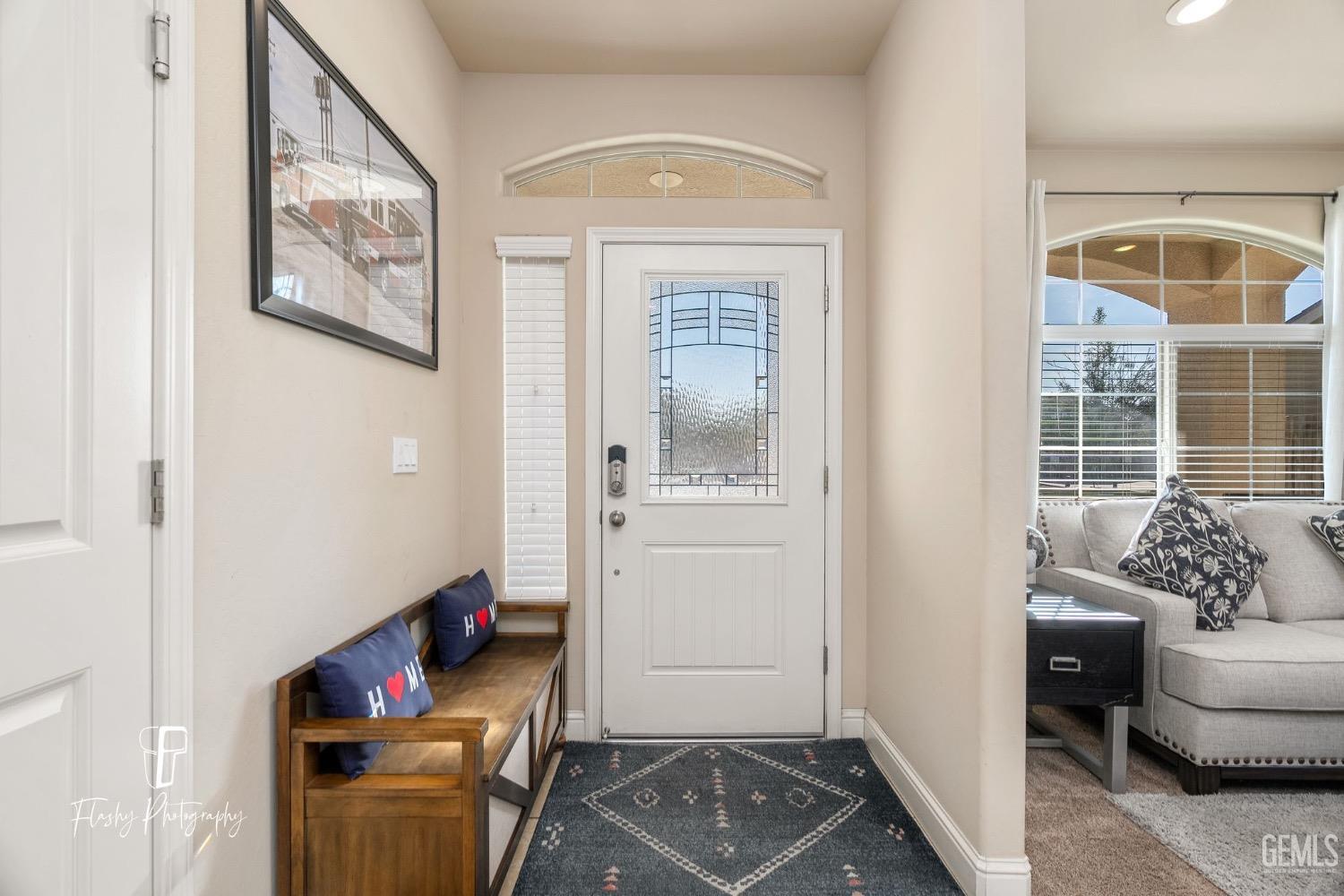 Undisclosed Address Bakersfield, CA 93313 - Photo 10 of 36 a living room with furniture and a window