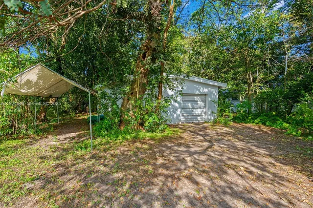 a house view with a garden space