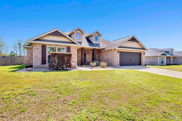 a front view of a house with swimming pool