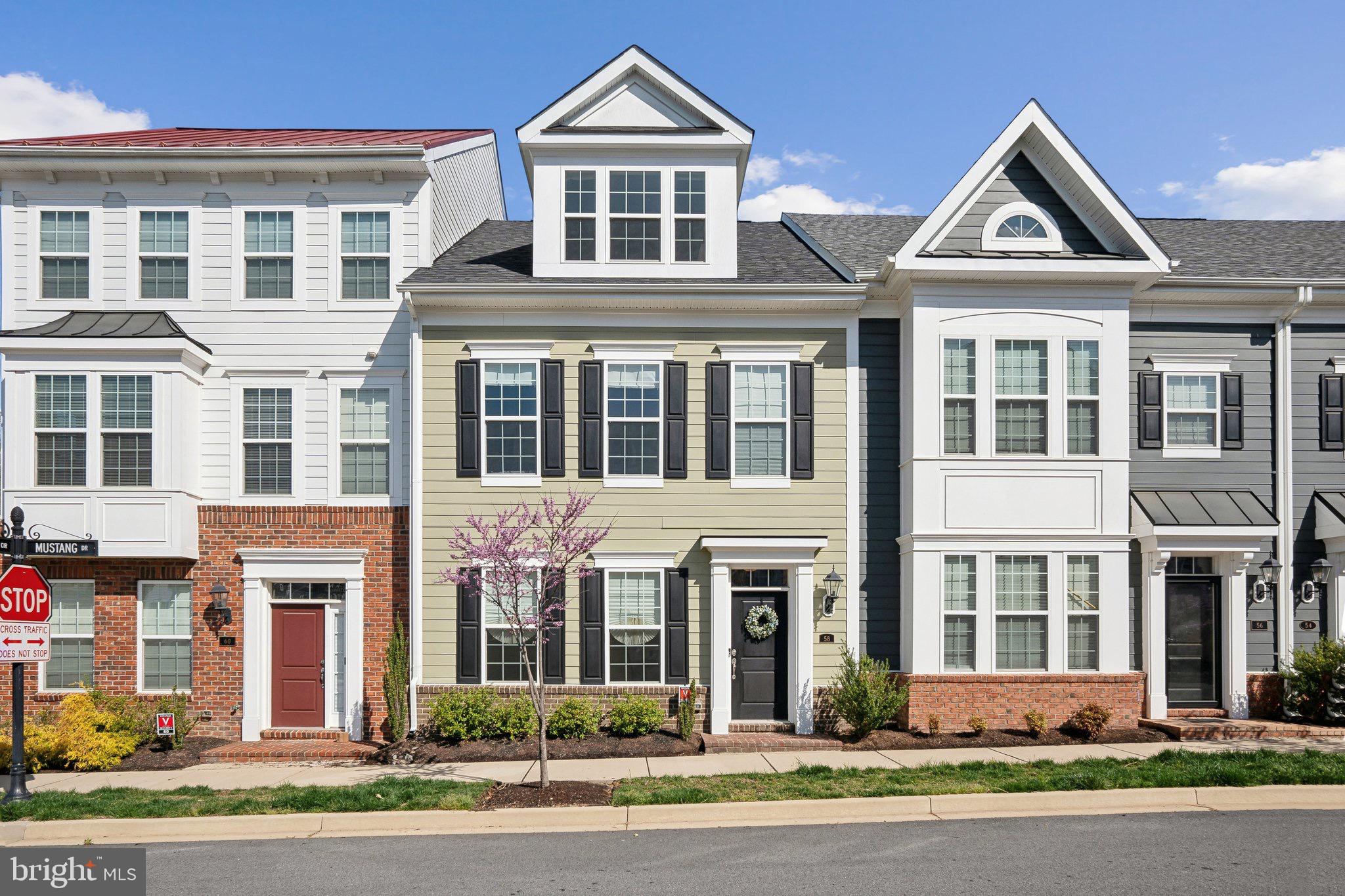 58 Mustang Drive La Plata, MD 20646 - Photo 1 of 42 front view of a residential apartment building with a yard