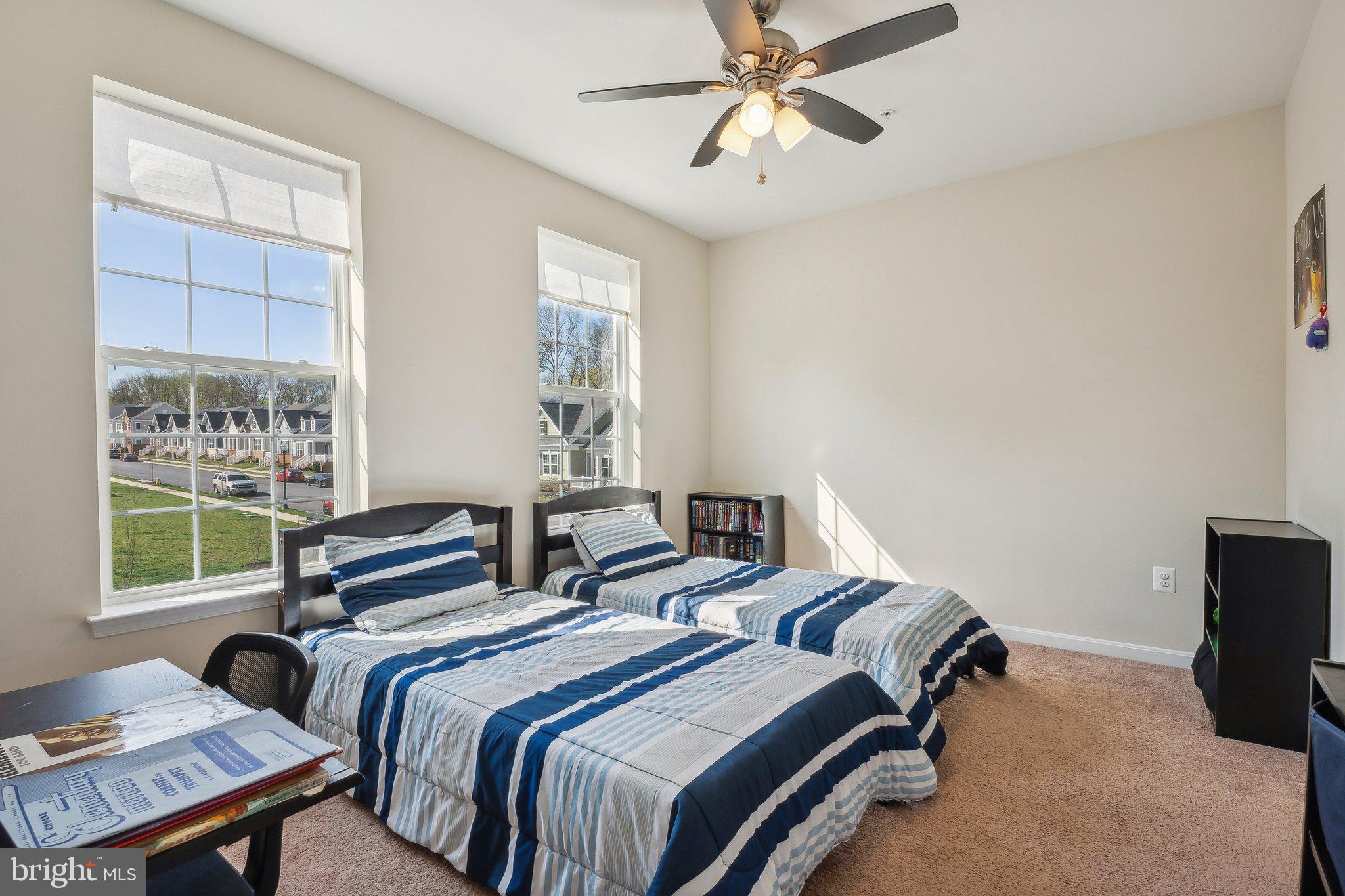 58 Mustang Drive La Plata, MD 20646 - Photo 22 of 42 a bedroom with two beds and a window
