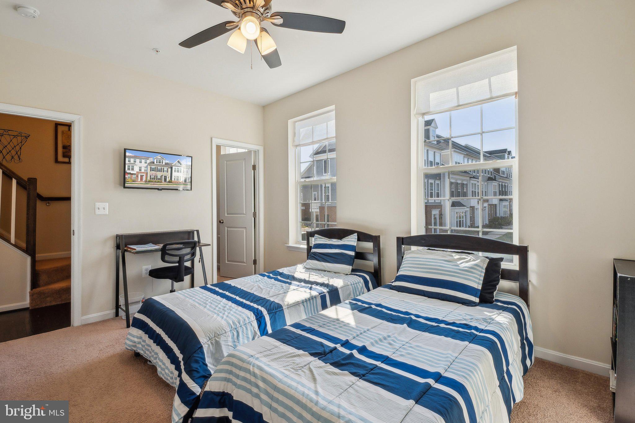 58 Mustang Drive La Plata, MD 20646 - Photo 23 of 42 a bedroom with two beds and a window