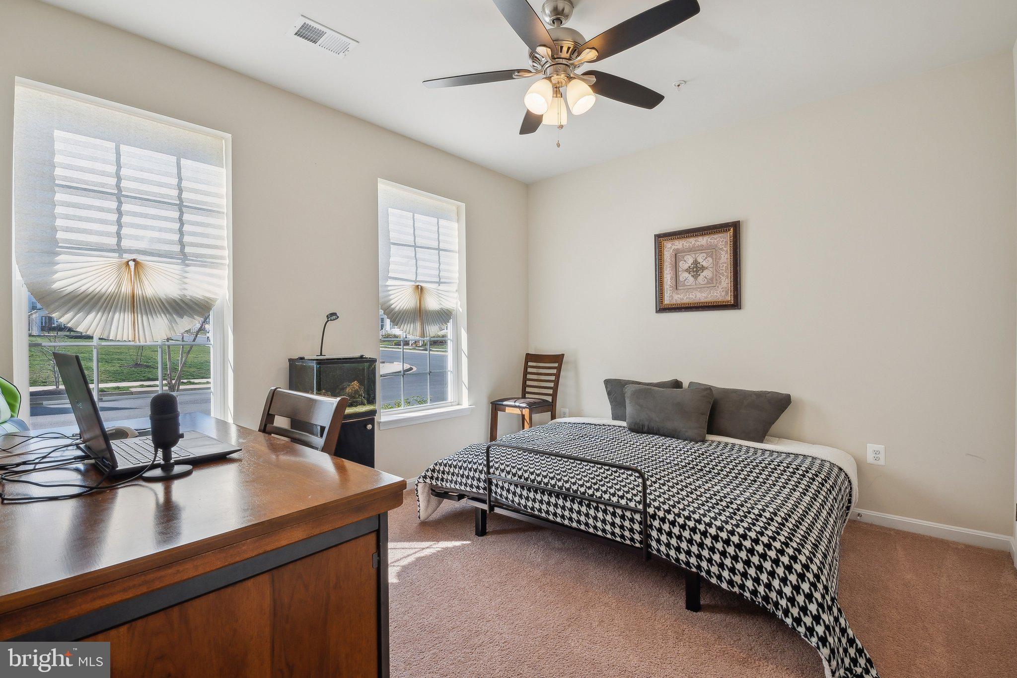 58 Mustang Drive La Plata, MD 20646 - Photo 3 of 42 a bedroom with a bed a couch and a large window