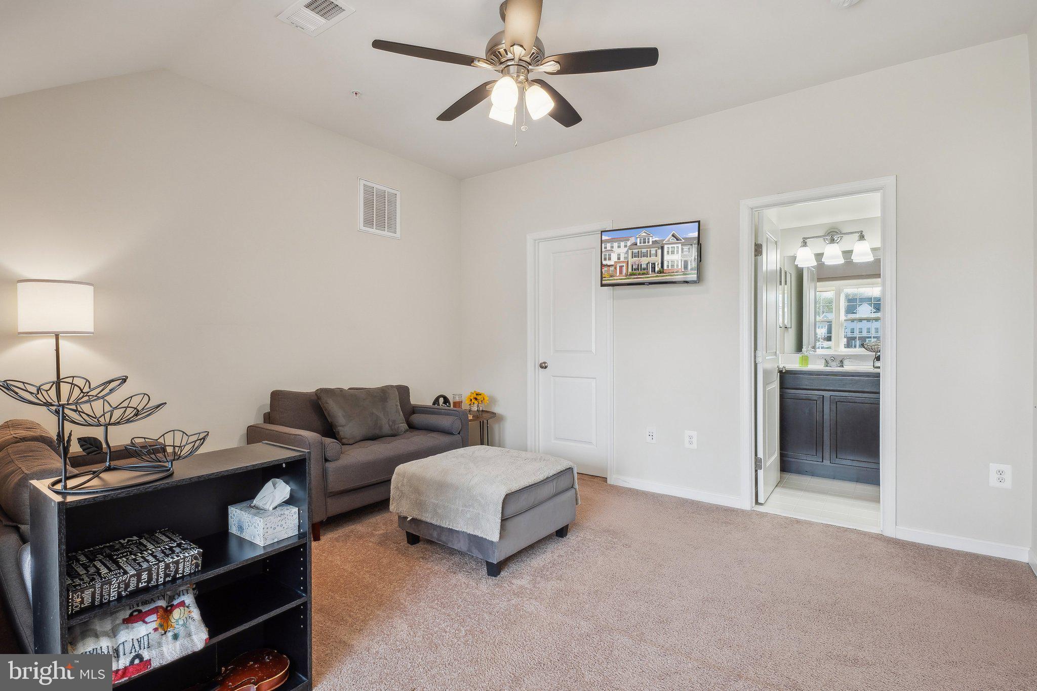 58 Mustang Drive La Plata, MD 20646 - Photo 31 of 42 a living room with furniture and a lamp