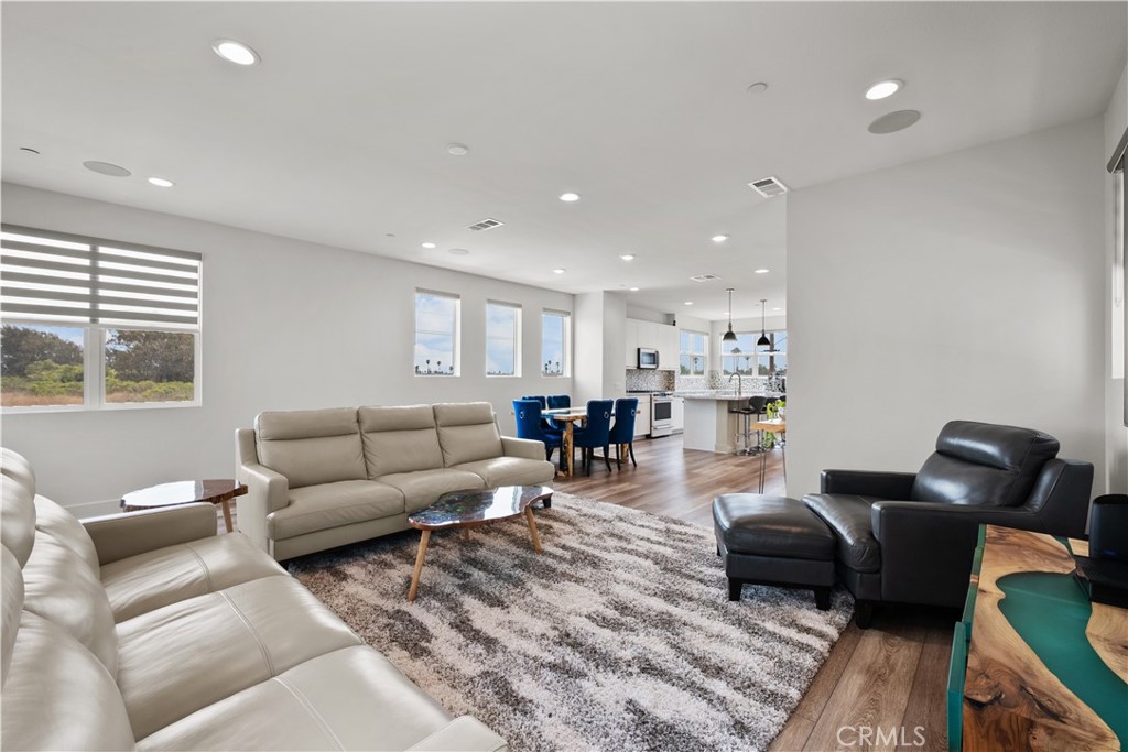 1068 Canal Street Oxnard, CA 93035 - Photo 16 of 36 a living room with furniture and a large window