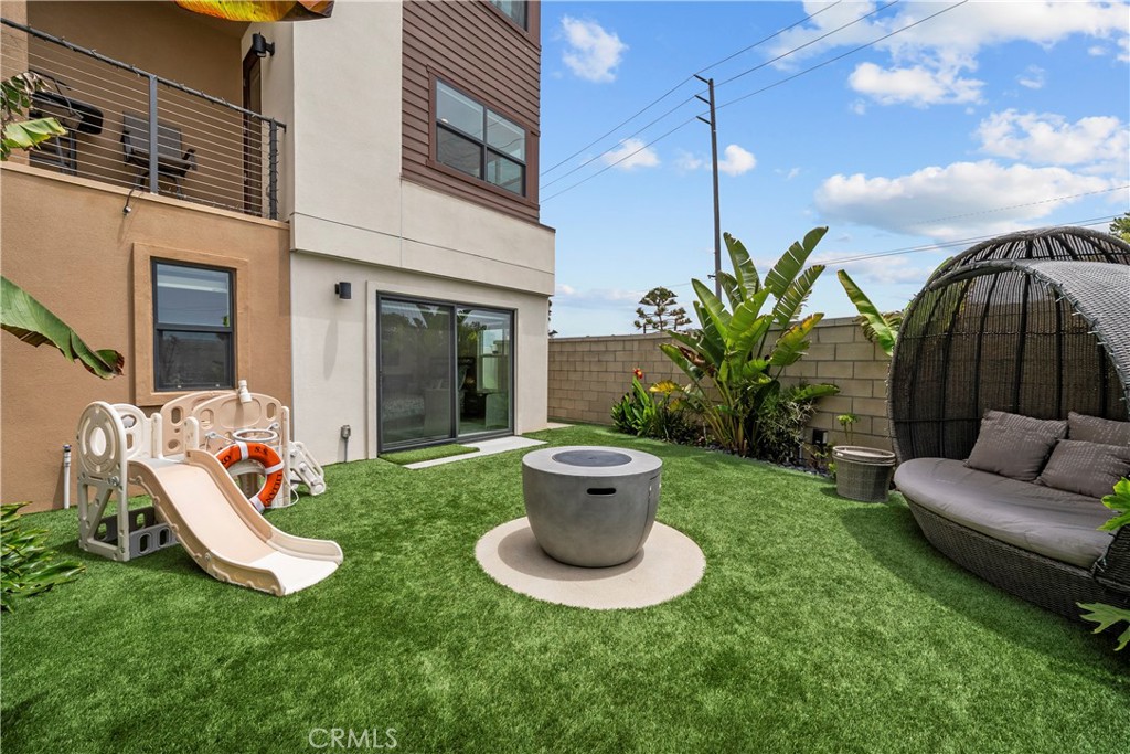 1068 Canal Street Oxnard, CA 93035 - Photo 2 of 36 a view of a chair and table in backyard of the house