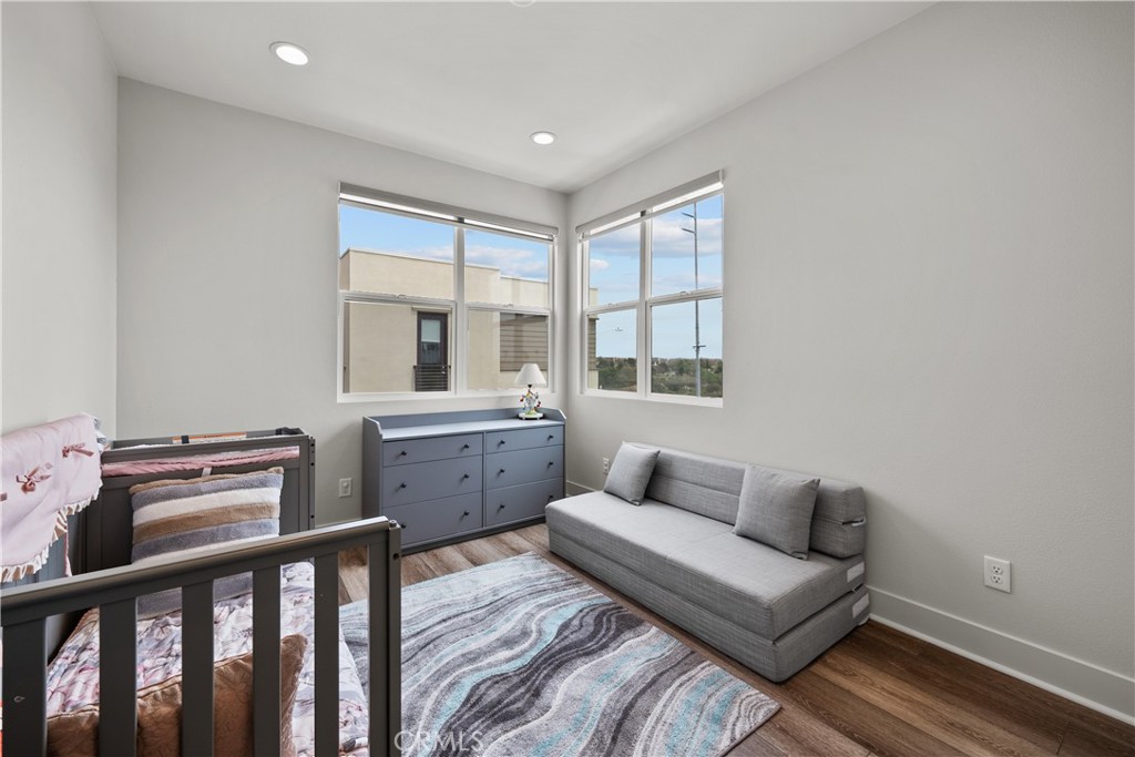 1068 Canal Street Oxnard, CA 93035 - Photo 26 of 36 a bedroom with furniture and a window