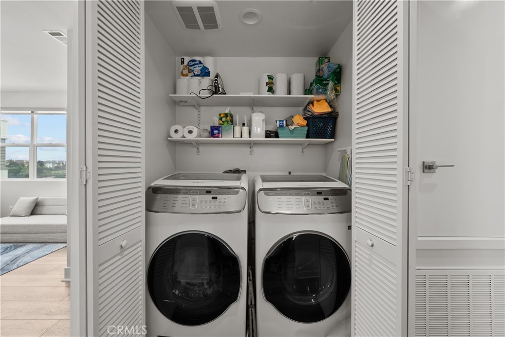 1068 Canal Street Oxnard, CA 93035 - Photo 32 of 36 a utility room with dryer and washer