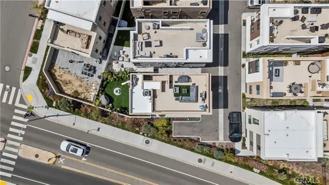 a city view with cars parked