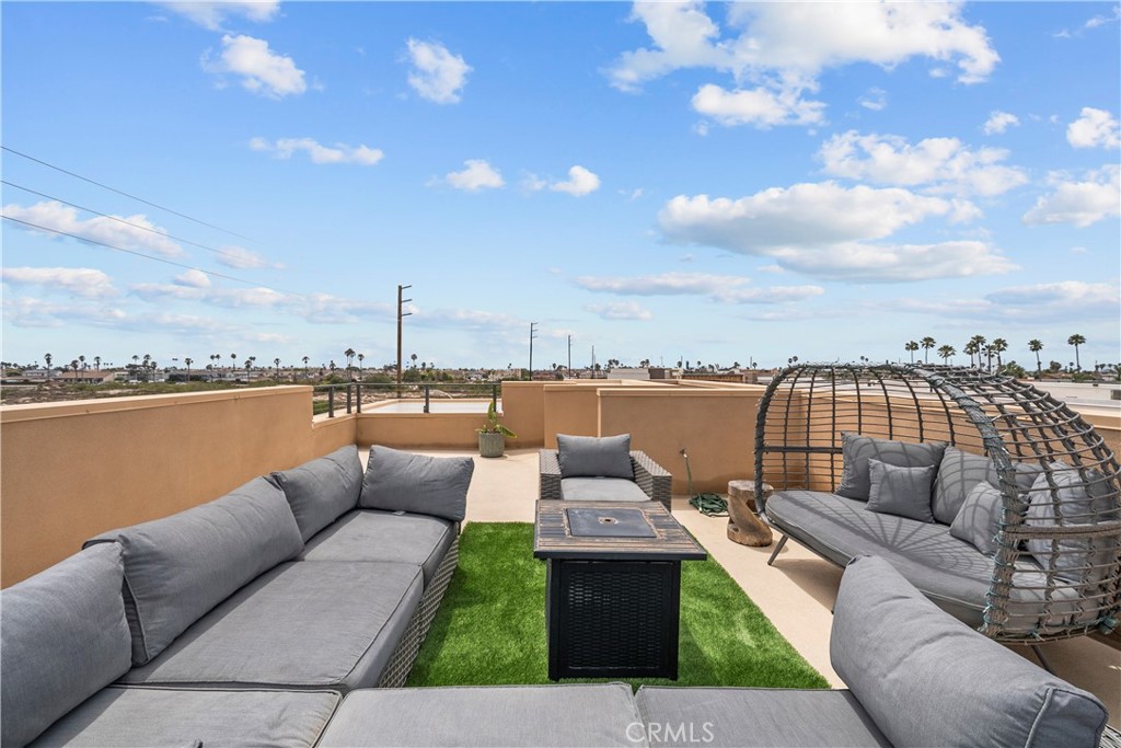 1068 Canal Street Oxnard, CA 93035 - Photo 4 of 36 a terrace view with seating space