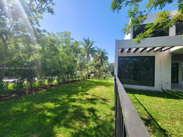a view of entryway with stairs and wooden floor
