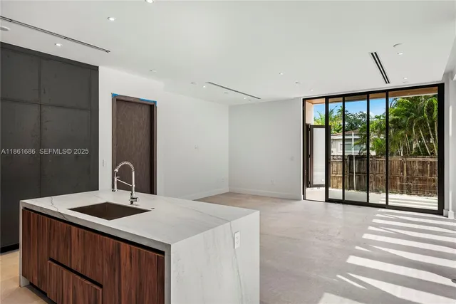 a view of hallway with a large window