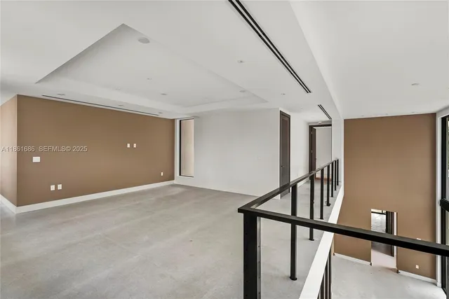 a view of a glass door with wooden floor