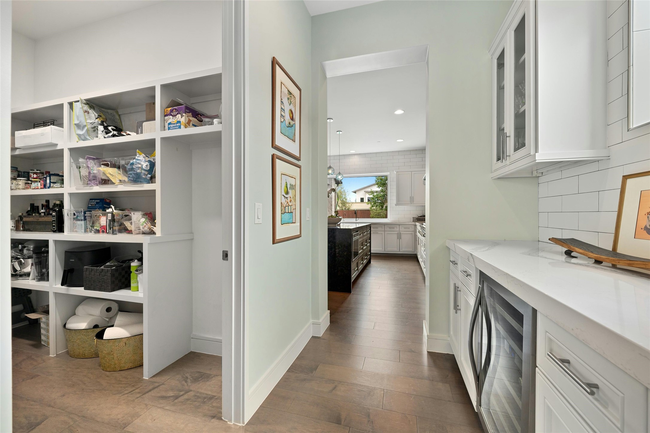 2201 Cypress Point West Austin, TX 78746 - Photo 10 of 37 a view of a kitchen with fridge and rack