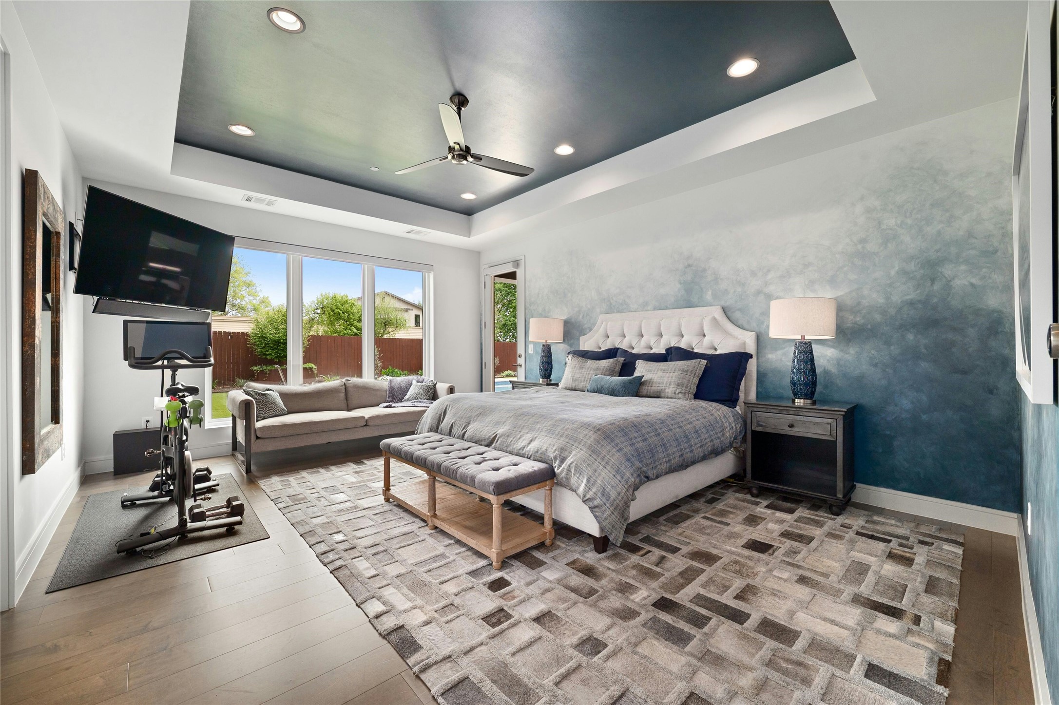 2201 Cypress Point West Austin, TX 78746 - Photo 14 of 37 a bedroom with a large bed and a couch