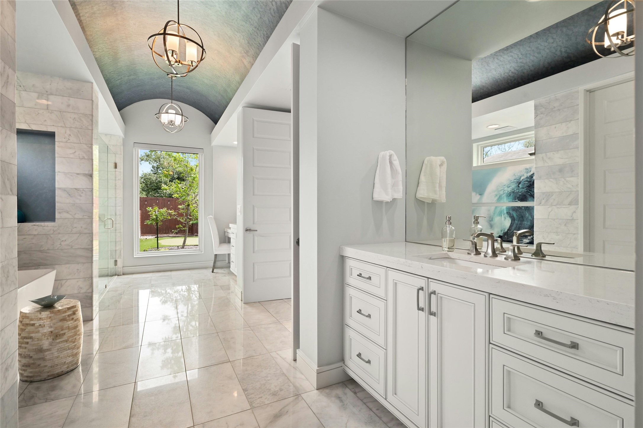 2201 Cypress Point West Austin, TX 78746 - Photo 16 of 37 a spacious bathroom with a toilet sink and mirror