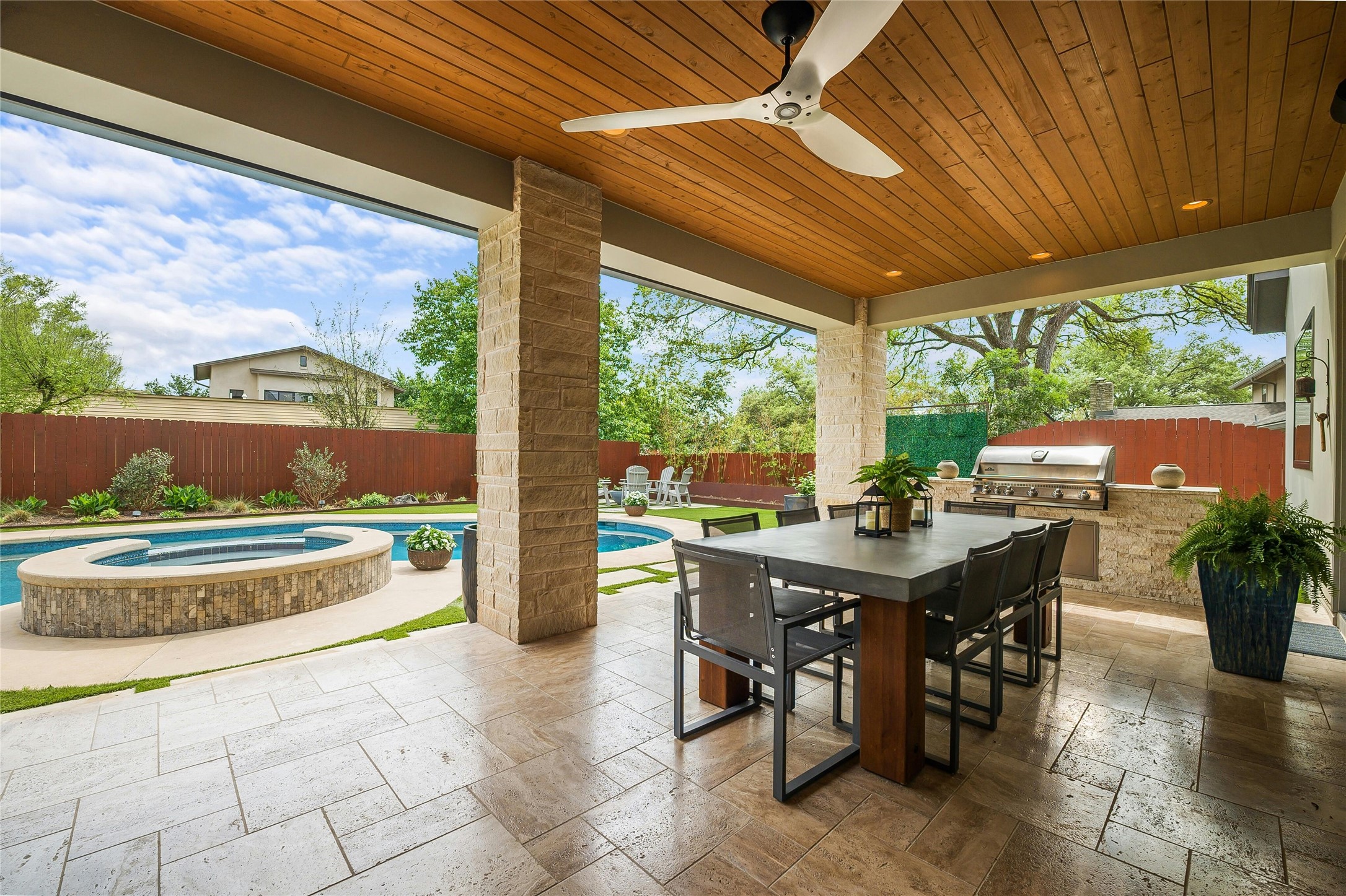 2201 Cypress Point West Austin, TX 78746 - Photo 20 of 37 a outdoor dining space with furniture and garden view
