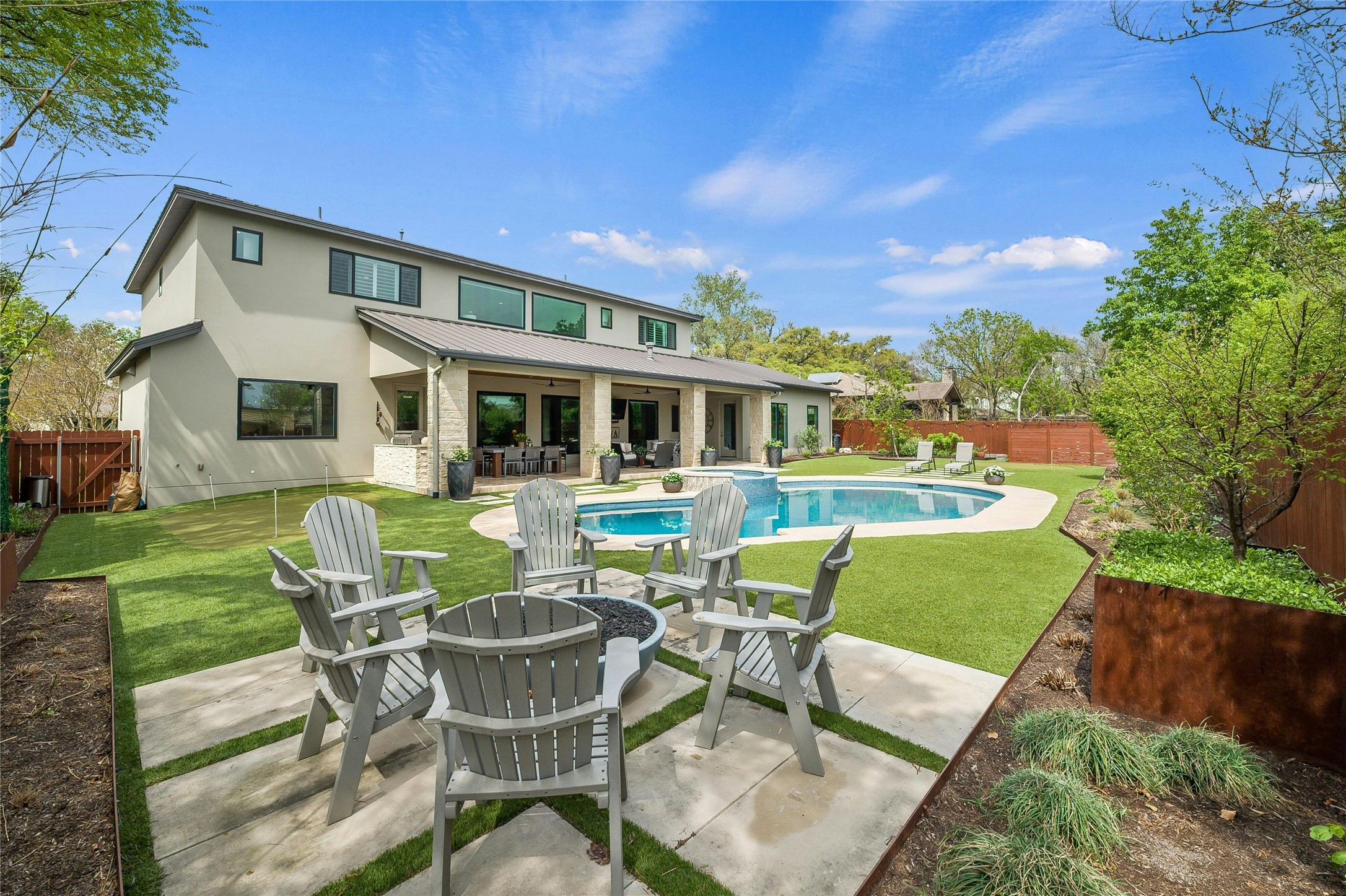 2201 Cypress Point West Austin, TX 78746 - Photo 21 of 37 a view of a house with a yard