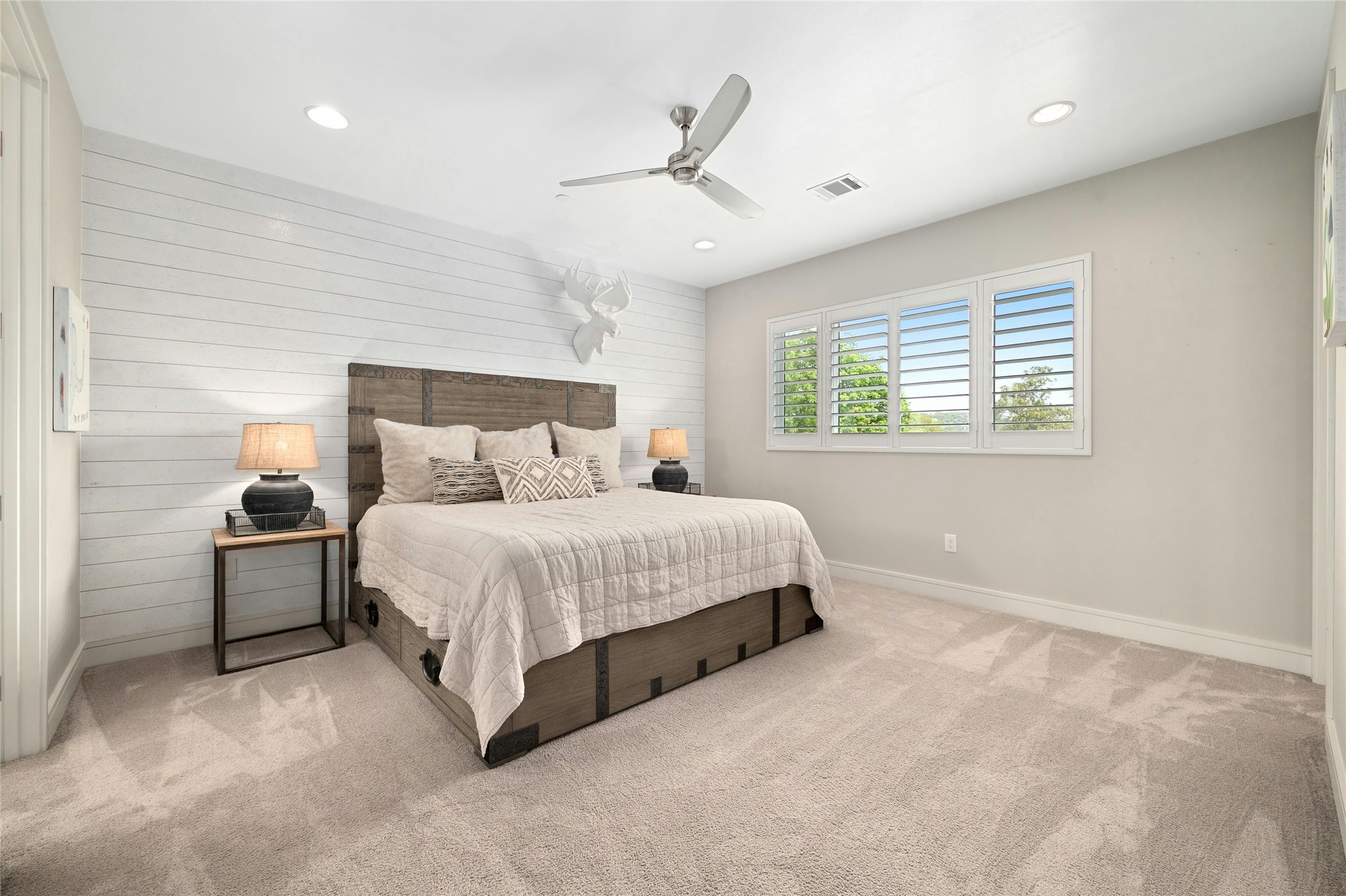 2201 Cypress Point West Austin, TX 78746 - Photo 28 of 37 a spacious bedroom with a bed and window