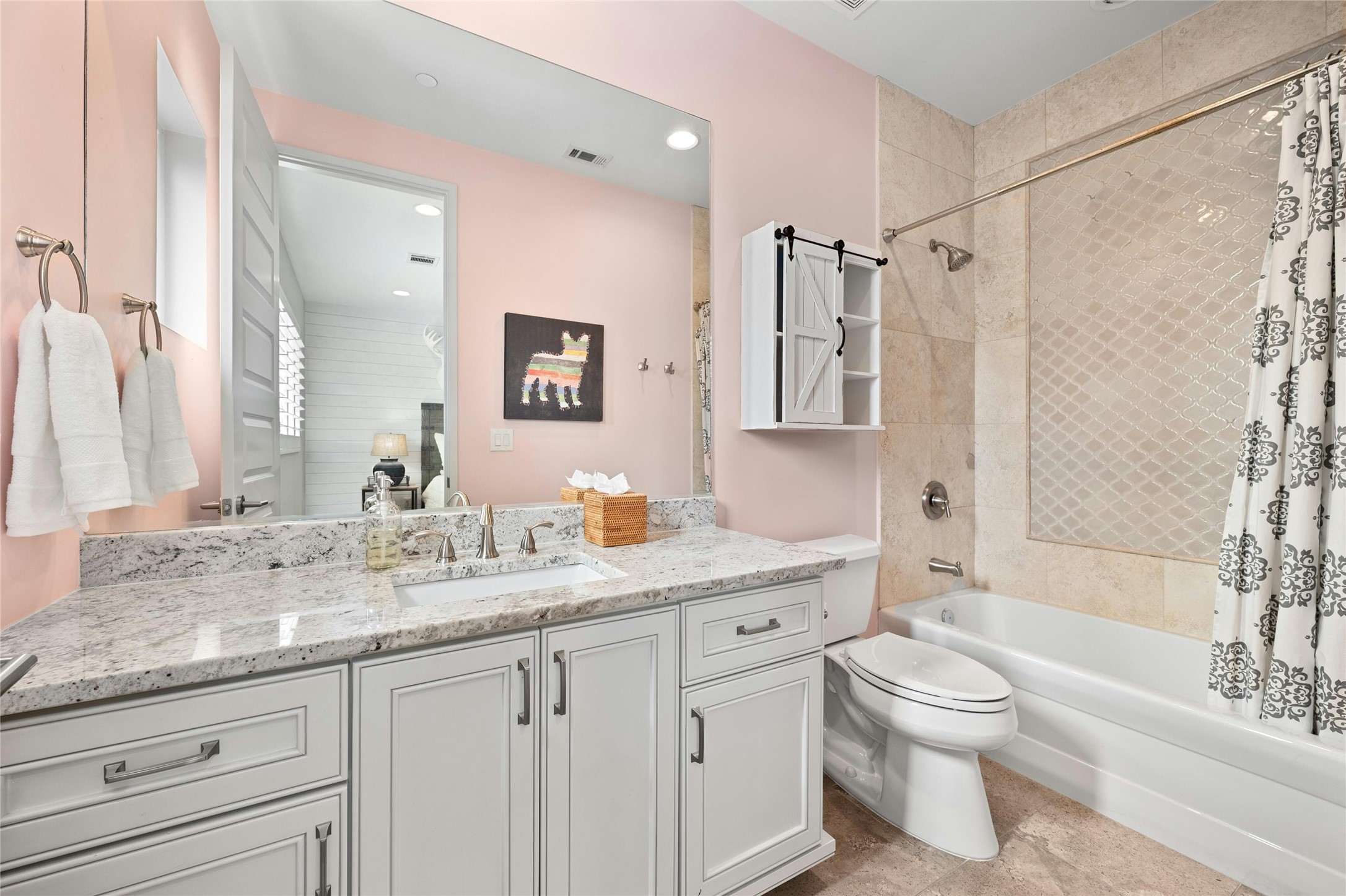 2201 Cypress Point West Austin, TX 78746 - Photo 29 of 37 a bathroom with a granite countertop sink toilet and shower