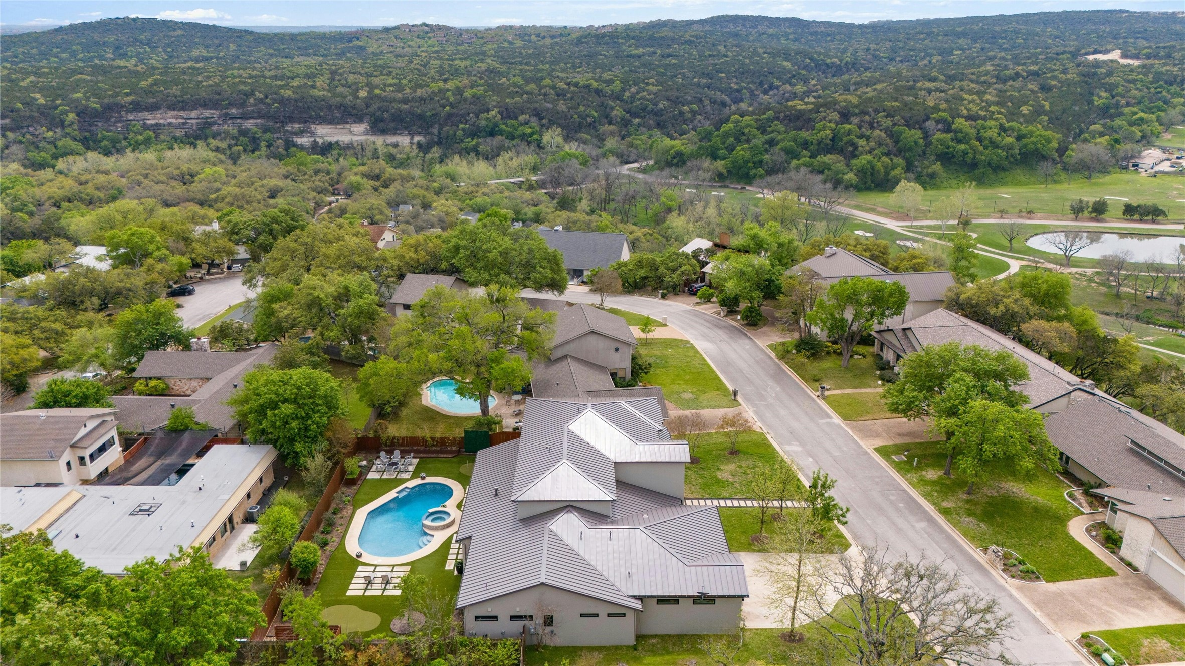 2201 Cypress Point West Austin, TX 78746 - Photo 36 of 37 an aerial view of house with yard swimming pool and mountains