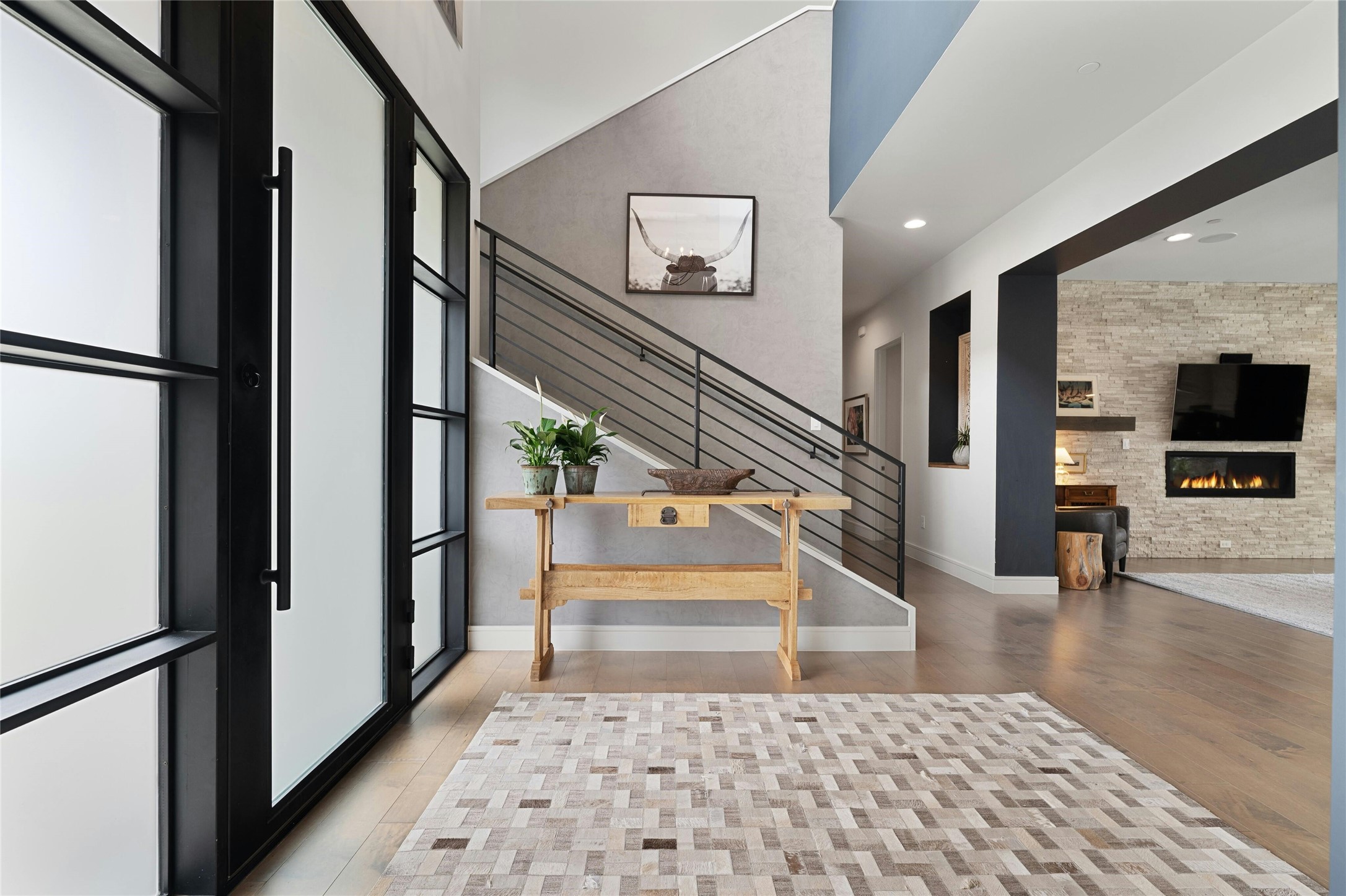 2201 Cypress Point West Austin, TX 78746 - Photo 4 of 37 a view of entryway and hall with wooden floor