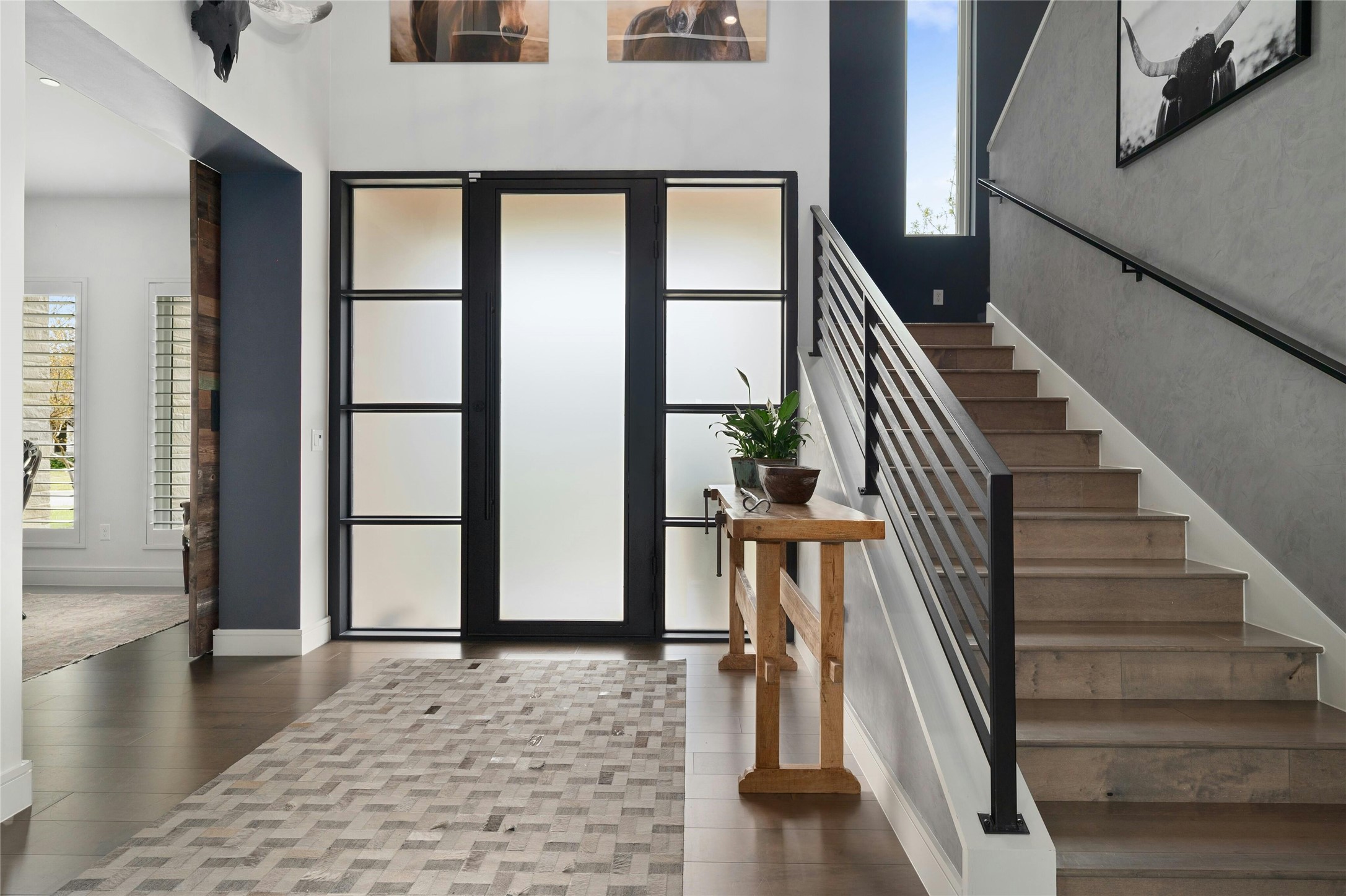 2201 Cypress Point West Austin, TX 78746 - Photo 5 of 37 a view of entryway and hall with wooden floor