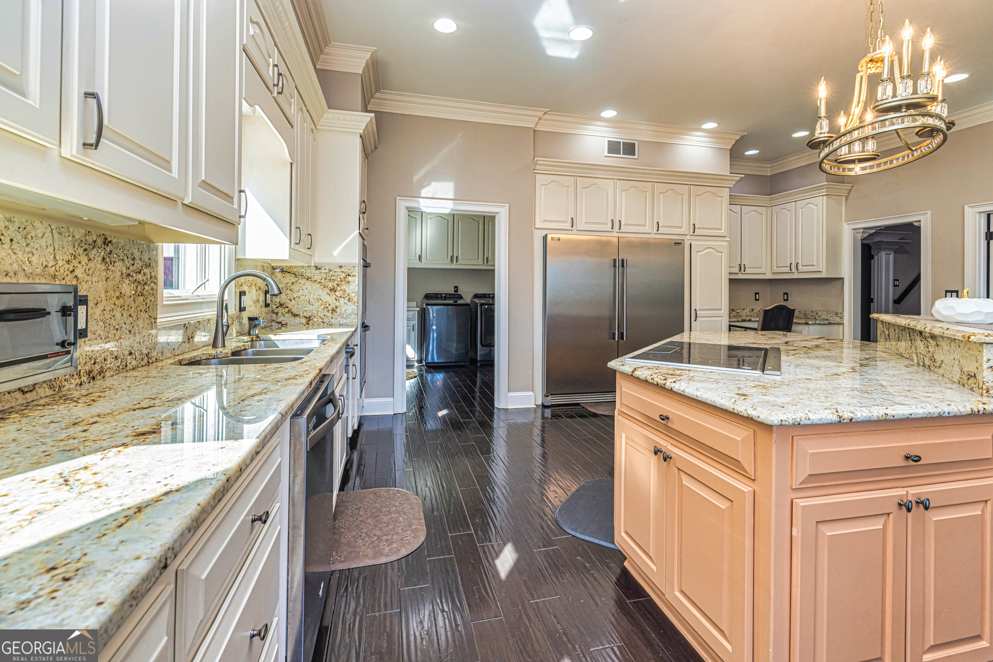 131 Lincoln Road Tyrone, GA 30290 - Photo 24 of 78 a kitchen with stainless steel appliances granite countertop a sink refrigerator and cabinets