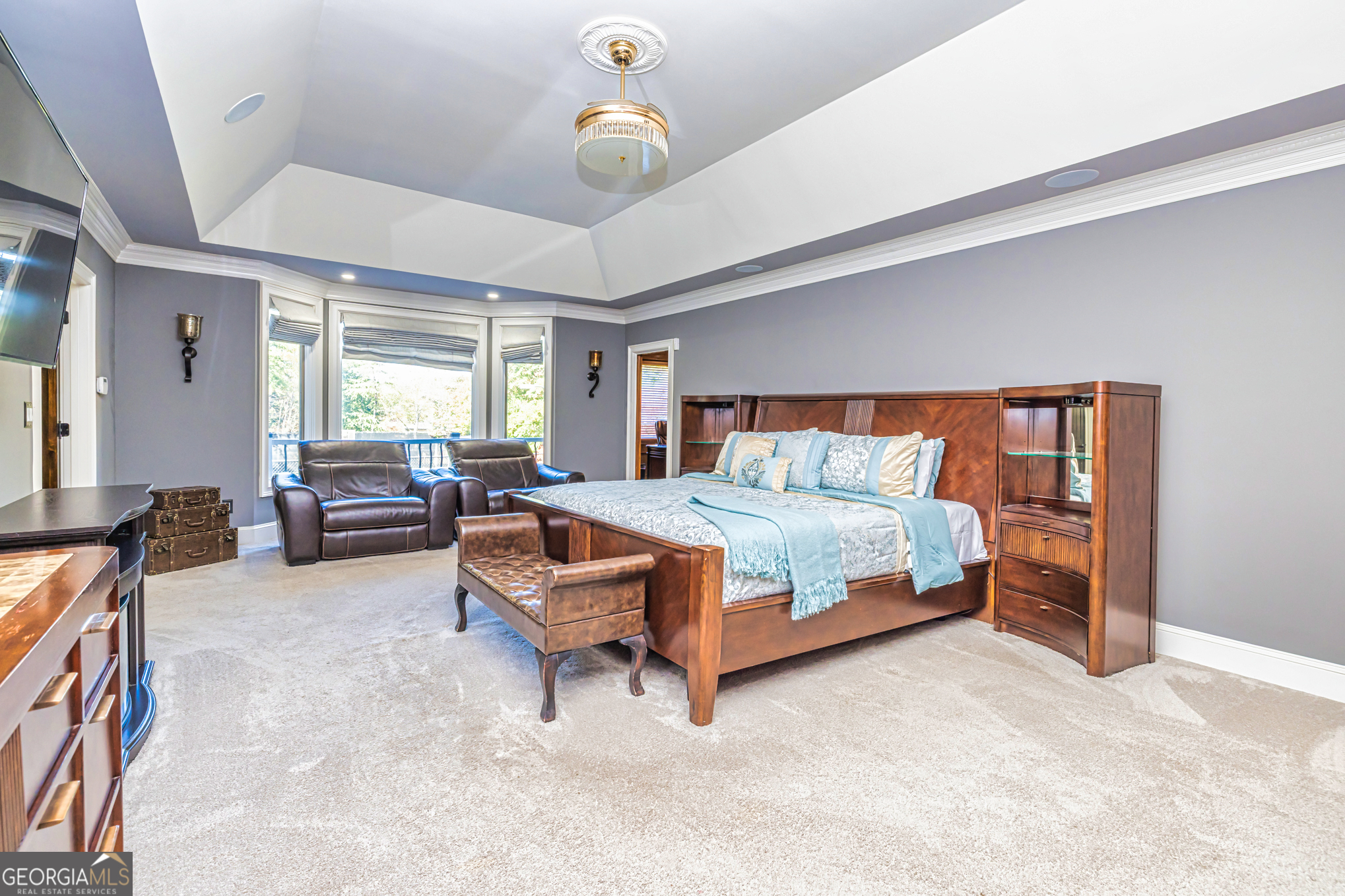 131 Lincoln Road Tyrone, GA 30290 - Photo 34 of 78 a bedroom with a bed window and couch
