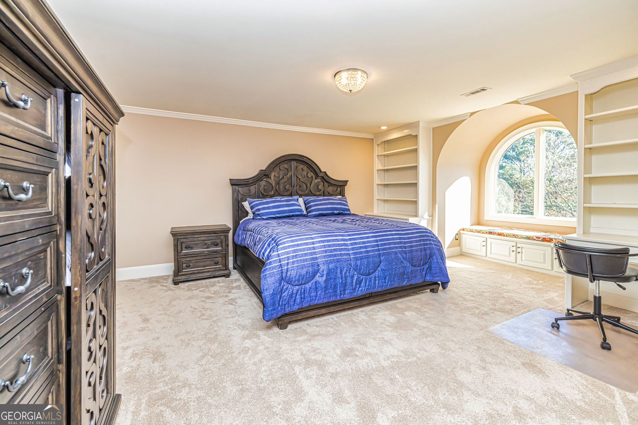 131 Lincoln Road Tyrone, GA 30290 - Photo 55 of 78 a bedroom with a bed chair and a large window