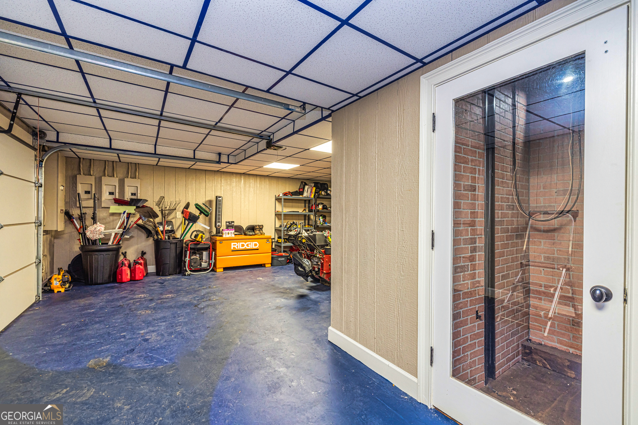 131 Lincoln Road Tyrone, GA 30290 - Photo 70 of 78 a view of a garage with rack and bicycle