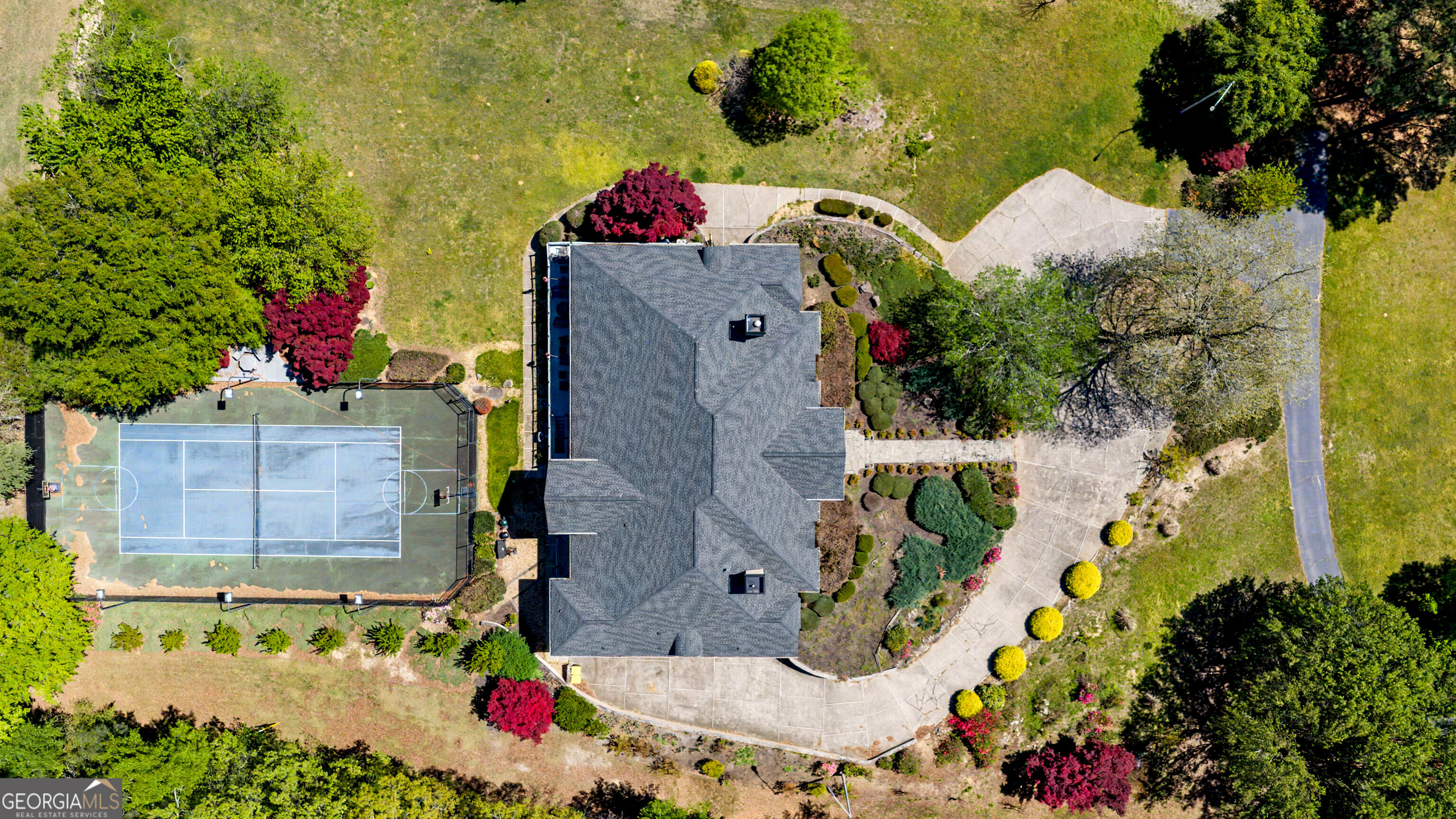 131 Lincoln Road Tyrone, GA 30290 - Photo 72 of 78 a aerial view of a house with a yard and garden