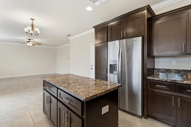 a view of a hallway with an entryway