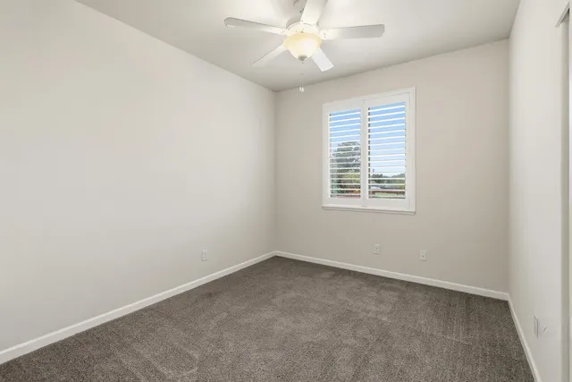 a bathroom with a sink double vanity and a mirror