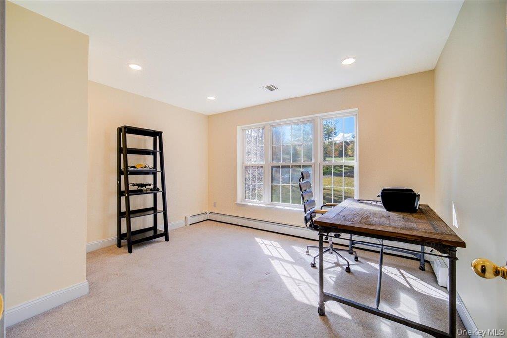34 Twin Lakes Road Monroe, NY 10950 - Photo 24 of 35 a living room with furniture and a window