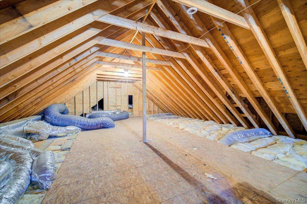 34 Twin Lakes Road Monroe, NY 10950 - Photo 27 of 35 a view of a room with wooden floor