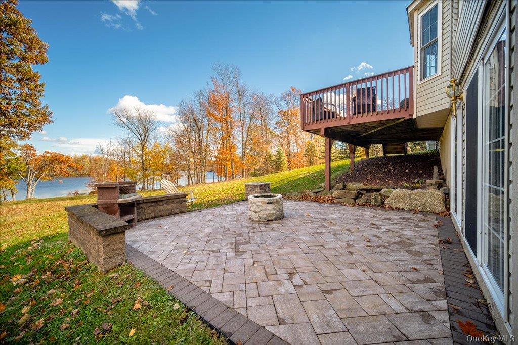 34 Twin Lakes Road Monroe, NY 10950 - Photo 29 of 35 a view of a swimming pool with a lounge chairs