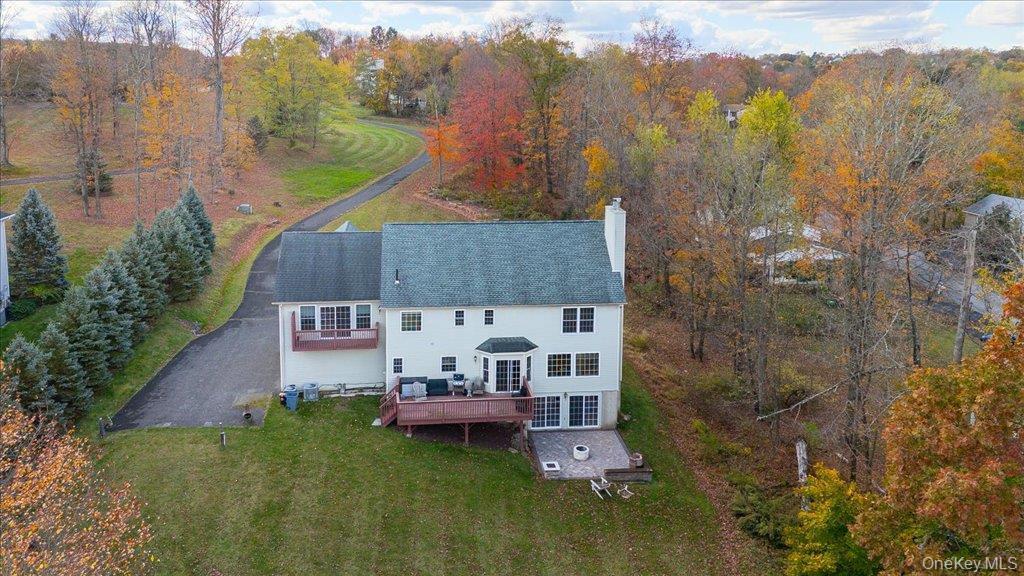34 Twin Lakes Road Monroe, NY 10950 - Photo 4 of 35 a aerial view of a house with swimming pool and a yard